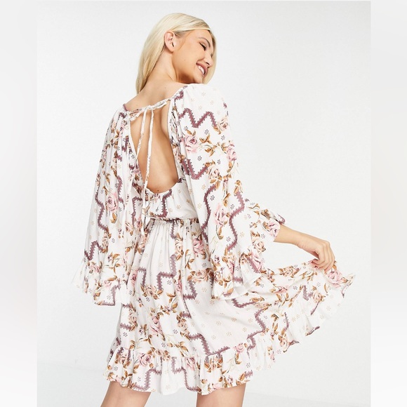 ASOS Design 70s Boho Pink and White Floral Bell Sleeve Ruffle Mini Dress - Picture 2 of 9